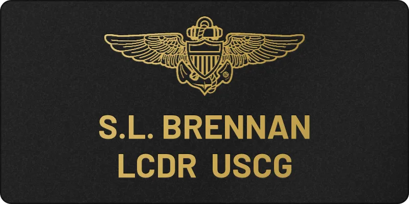 Custom 2x4 Coast Guard aviator flight suit name tag, black leatherette engraved gold with aviator wings, name and rank